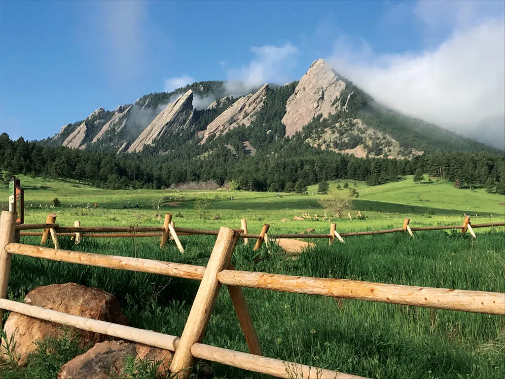 Mountains and green meadow at the Chautauqua park near Boulder, CO.