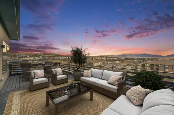 Rendezvous rooftop deck at sunset with view of mountains